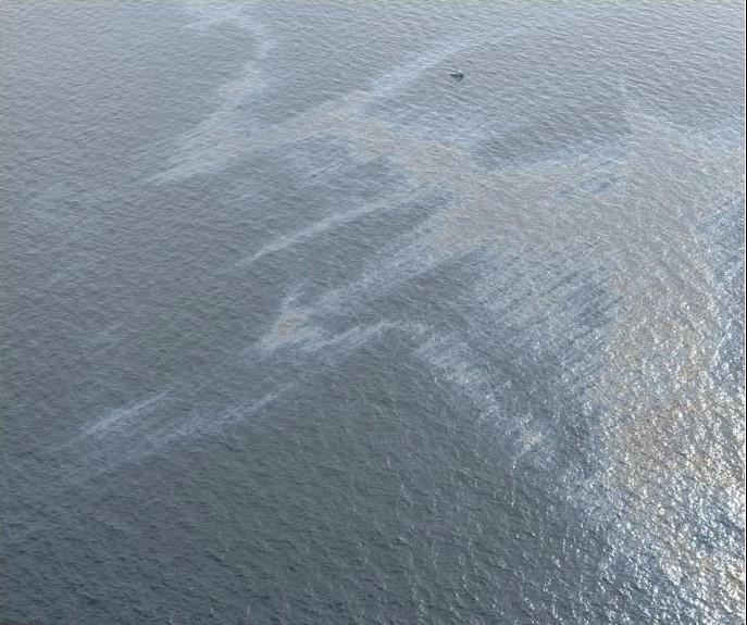 Oil slick on water in the ocean. 