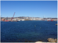Gloucester harbor dredging area with a crane in the background